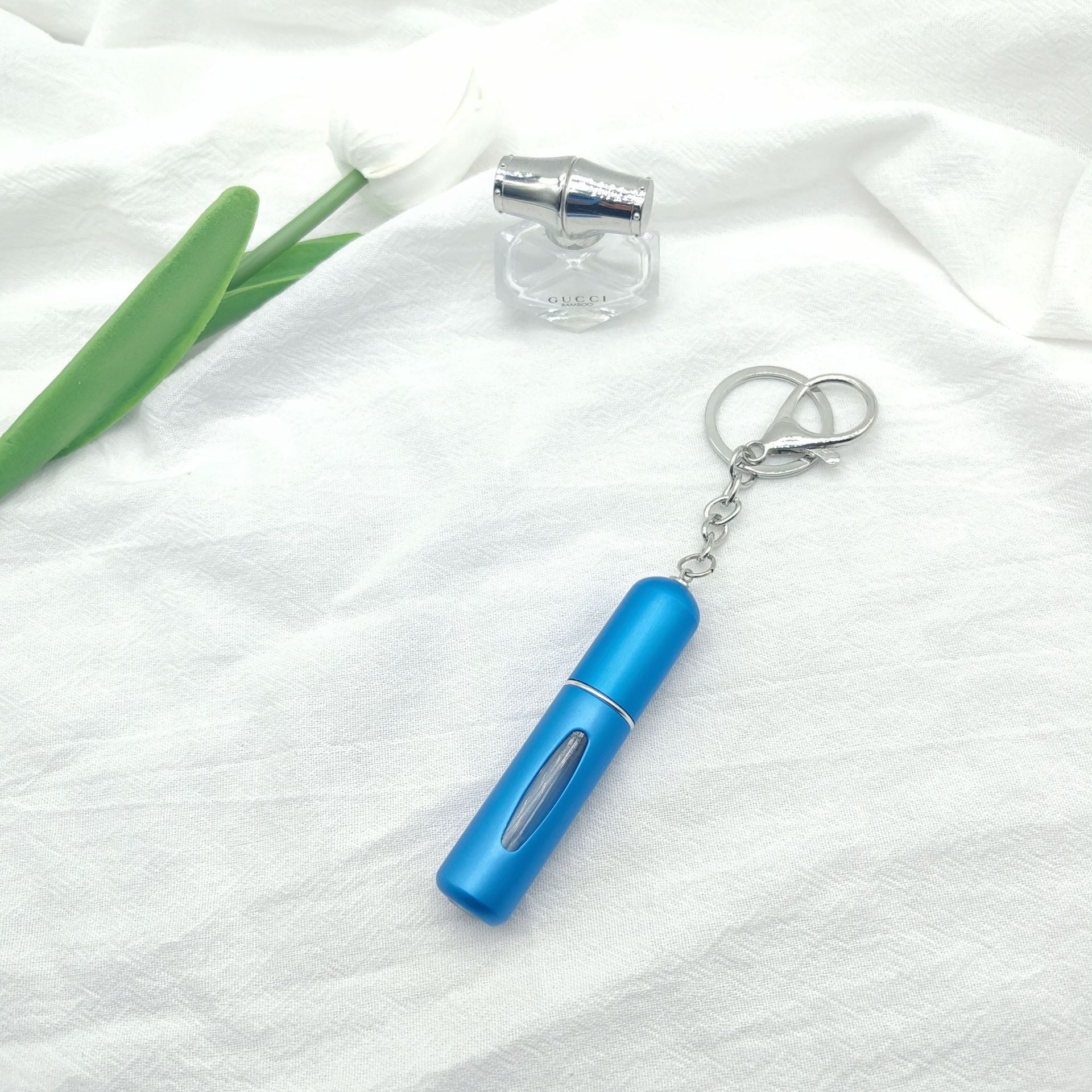 Wholesale bottom filling pump 5ml high color value sample key chain perfume bottle